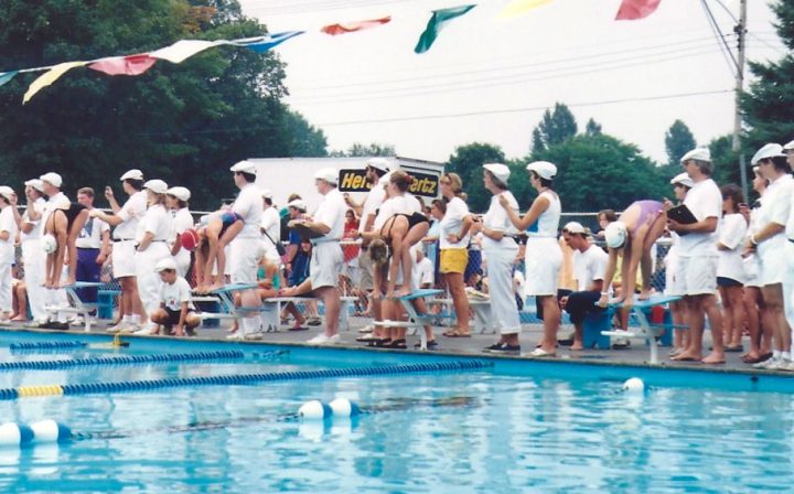 Erin Bonilla as a young girl on the blocks at Beaurepaire Swim Club getting taking off into the pool.